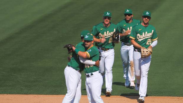 A's infielders, outfielders celebrate Game 2 win